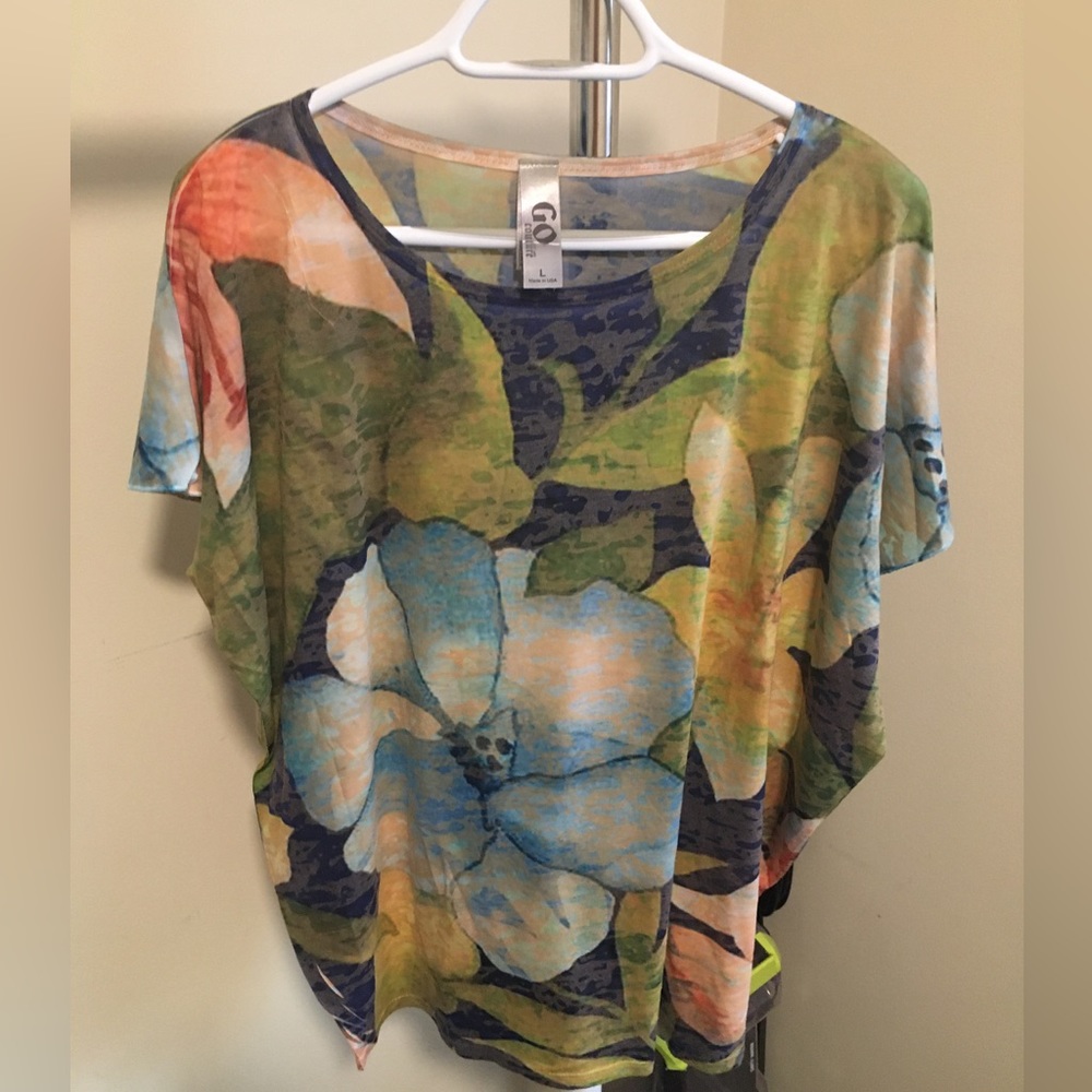 Go Couture multi colored, dolman short sleeve shirt.